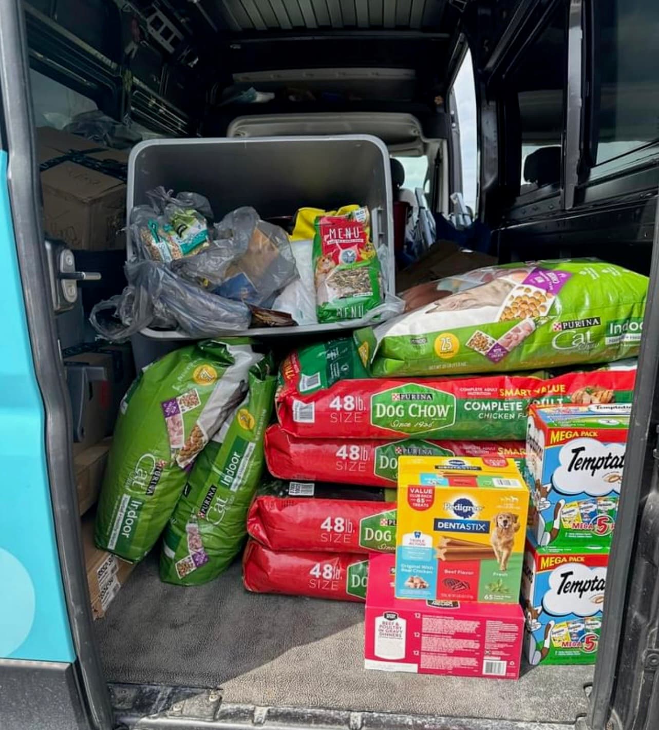 Dog food donation made to MCQE Mobile Pet Pantry in Wesmtinster, MD