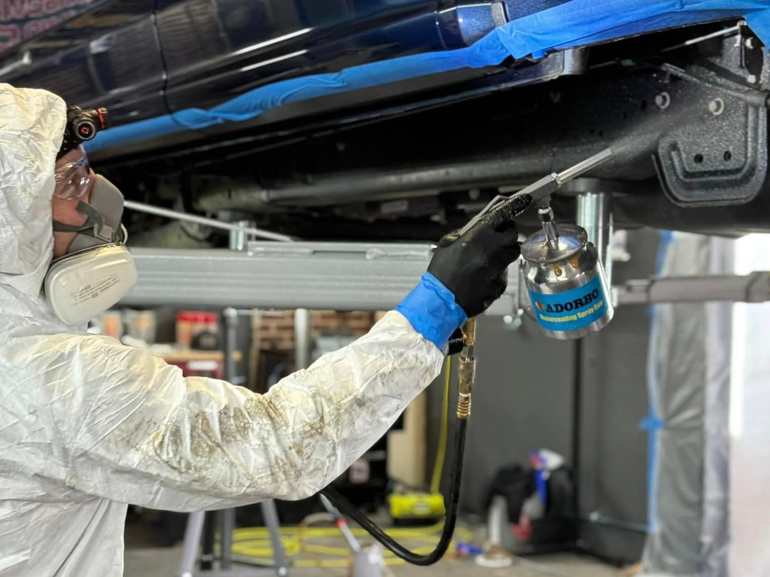 Car getting Undercoating, Oil Undercoating Service